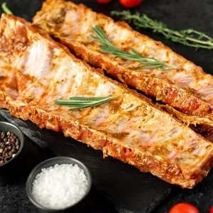 Costillas Adobadas en Tira de Cerdo 50% Duroc Lomesa